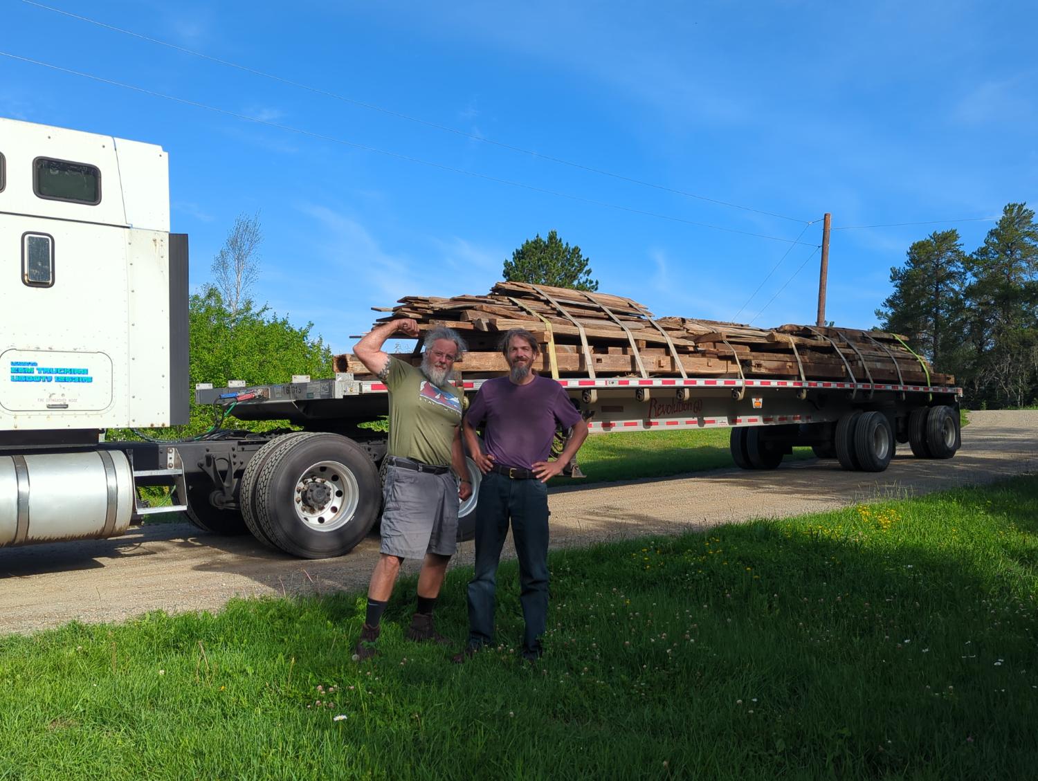 Reclaimed wood and materials staged for large-scale builds