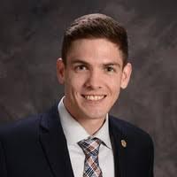 Professional headshot of John Lenich
